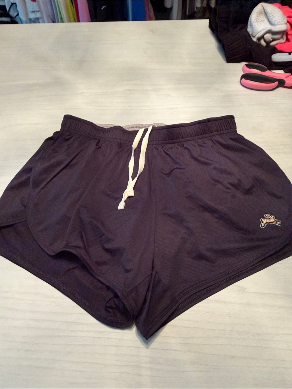 Tracksmith Women's Twilight Split Athletic Shorts.